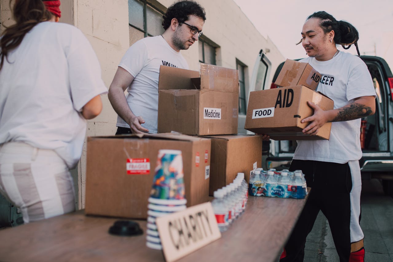 Volunteers packing food boxes